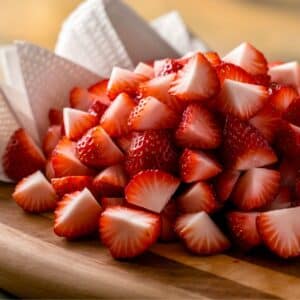 Dice strawberries into small pieces and pat dry with paper towels to remove excess moisture.