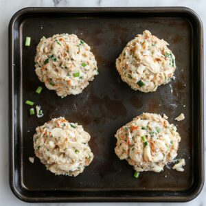 Form crab mixture into 4 patties.