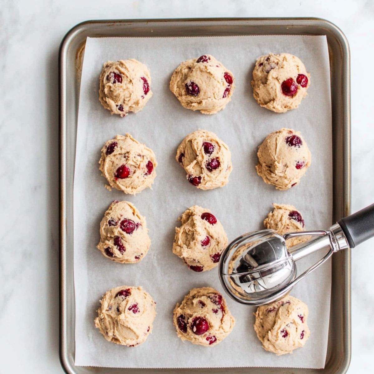 Drop dough by rounded tablespoonfuls 2 inches apart onto ungreased cookie sheets.