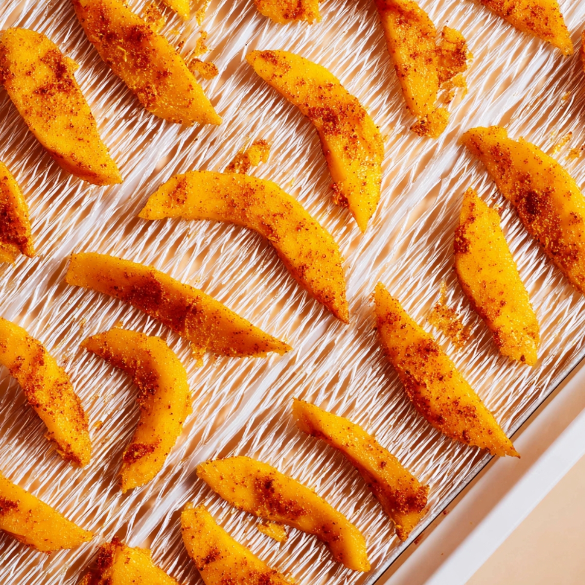 Easy Dehydrate Mango Recipe 12 Lay the mango strips in a single layer on your dehydrator trays. Don't let them overlap or they'll stick together and dry unevenly.
