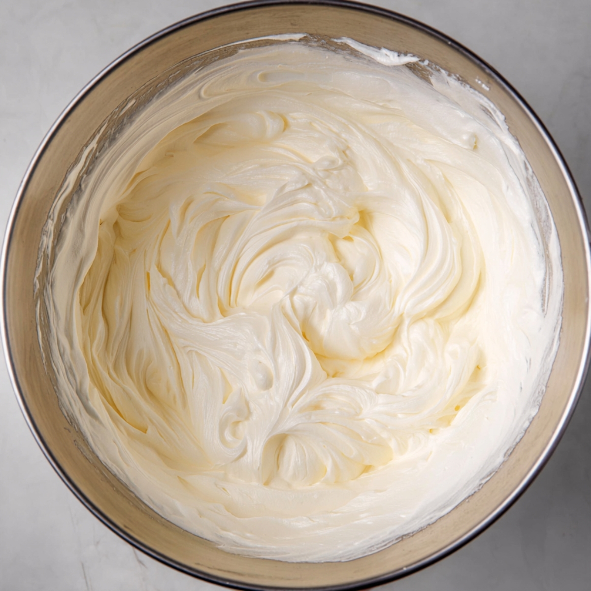 Easy Lotus Biscoff Cheesecake 11 In a stand mixer, beat the softened cream cheese and sugar on medium speed for about 2 to 3 minutes until the mixture looks fluffy and smooth. Scrape down the sides of the bowl as needed.