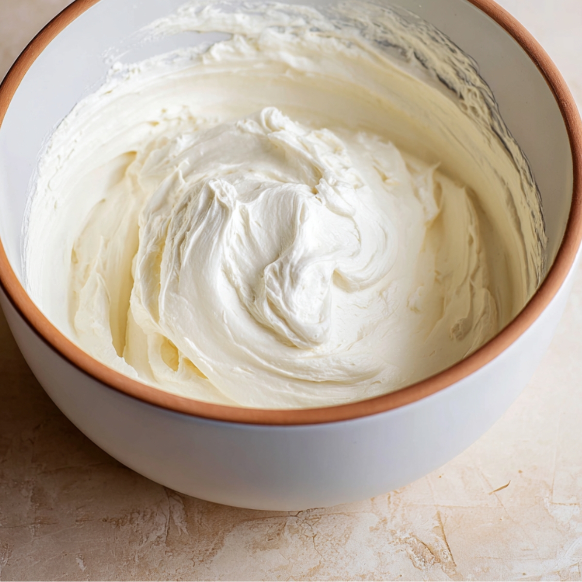 Raspberry Tiramisu Recipe | Creamy & Easy Italian Dessert 12 Using a stand mixer or hand mixer, beat mascarpone cheese, powdered sugar, lemon juice, and vanilla paste for about 30 seconds until smooth and combined. Scrape down the sides of the bowl, then add the cold heavy cream. Whisk until the mixture forms medium-stiff peaks and looks fluffy.