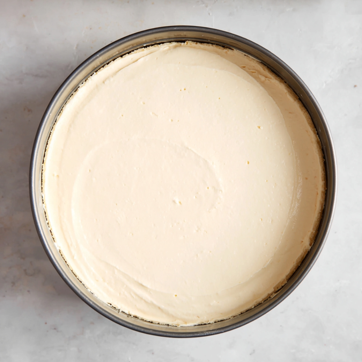 Easy Lotus Biscoff Cheesecake 13 Pour the filling over the chilled crust in the springform pan. Set the pan on a baking sheet to catch any drips, then slide it into the oven. Bake for 1 hour without opening the door.