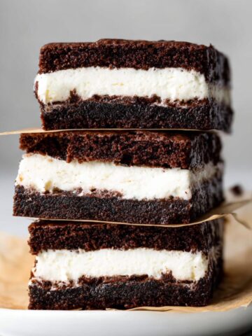 Stacked Brownie Ice Cream Sandwiches Recipe showing chocolate and vanilla layers.