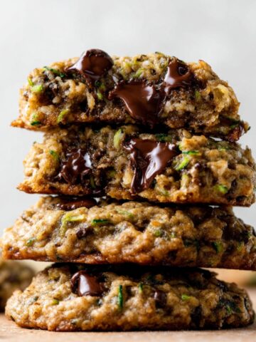 Soft Zucchini Chocolate Chip Cookies 1 Stacked Zucchini Chocolate Chip Cookies with gooey melted chocolate.