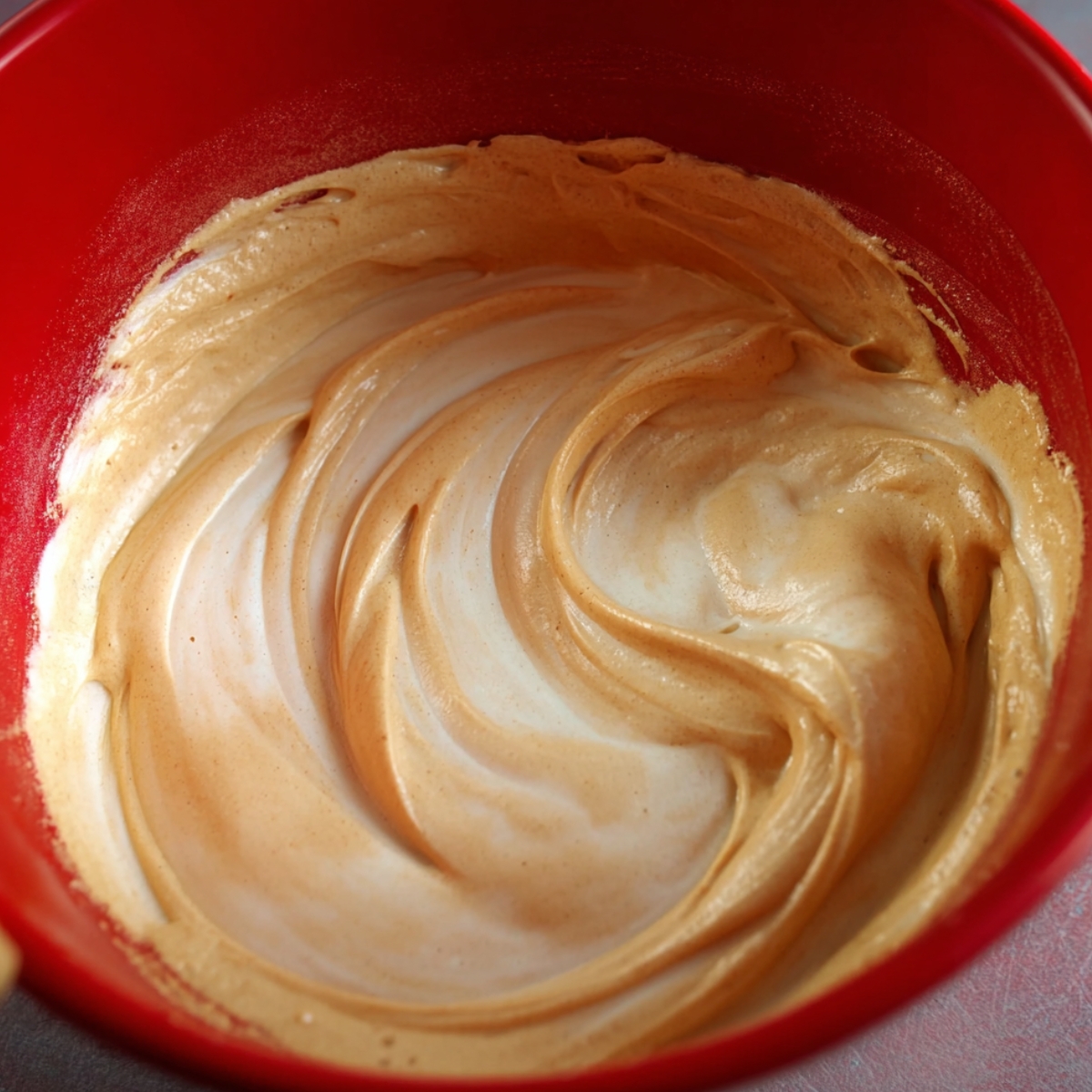 Easy Coffee Swiss Roll Recipe 10 Whipped coffee batter with a light and fluffy texture, ready for rolling.