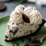 Sliced Cookies and Cream Pie showing creamy interior and Oreo crust