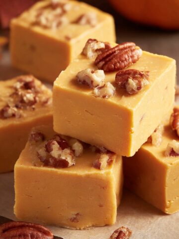 Pumpkin Spice Fudge Recipe 1 Delicious Pumpkin Spice Fudge cubes, topped with crunchy pecans, offering a rich fall-inspired treat.