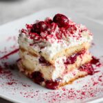 Cherry Amaretto Tiramisu with layers of cake and cream.