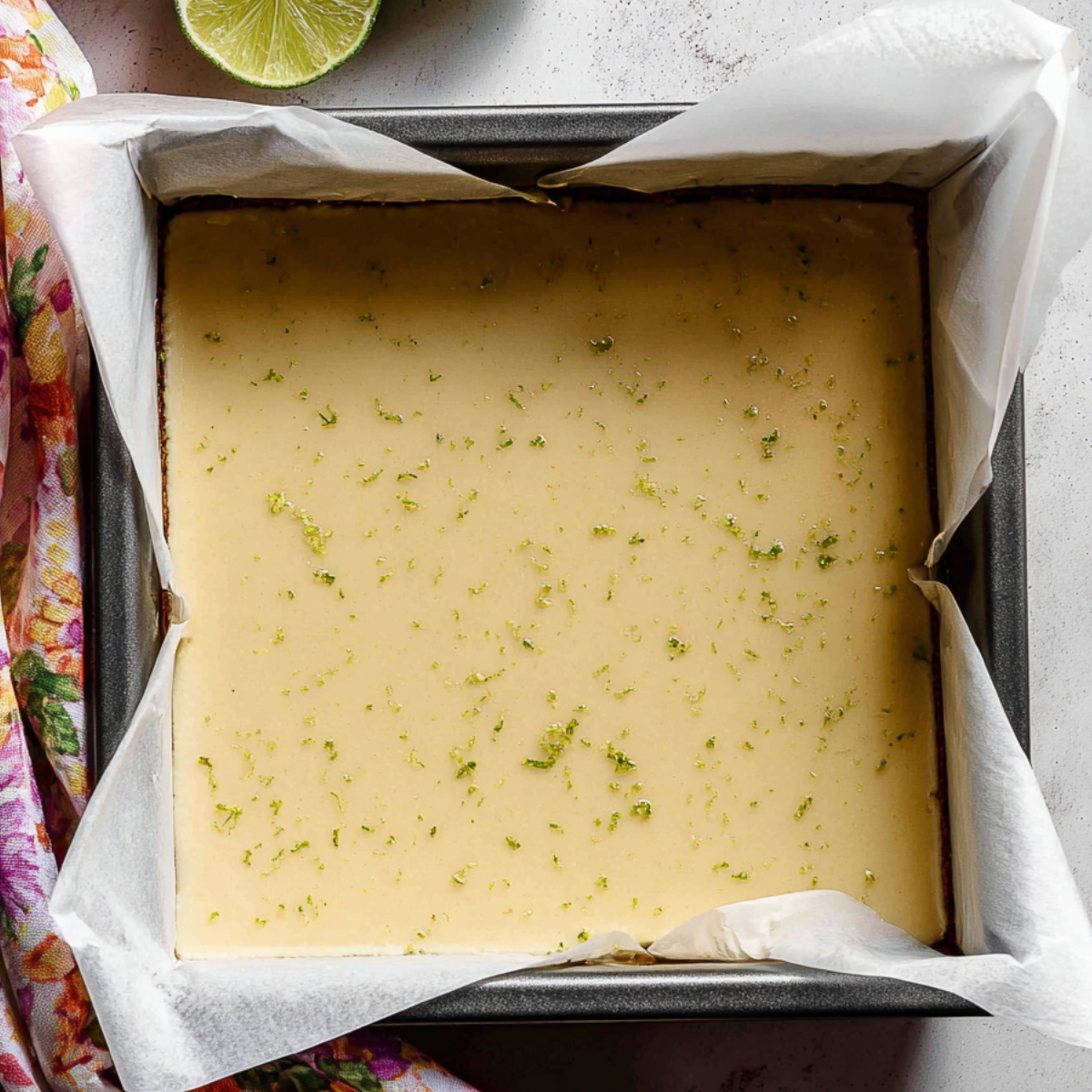 Easy Key Lime Pie Bars Recipe 11 Key lime pie filling set in a baking pan, ready to chill and firm up before serving.