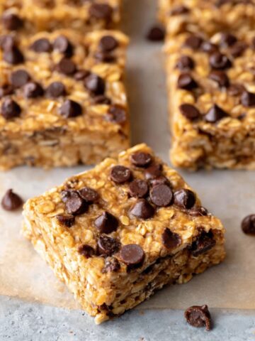 No Bake Peanut Butter Oatmeal Bars 2 Cut No Bake Peanut Butter Oatmeal Bars topped with chocolate chips.