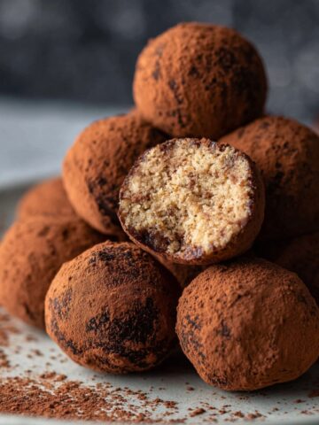 Neatly shaped Tiramisu Balls arranged on a plate, ready to be coated or served.