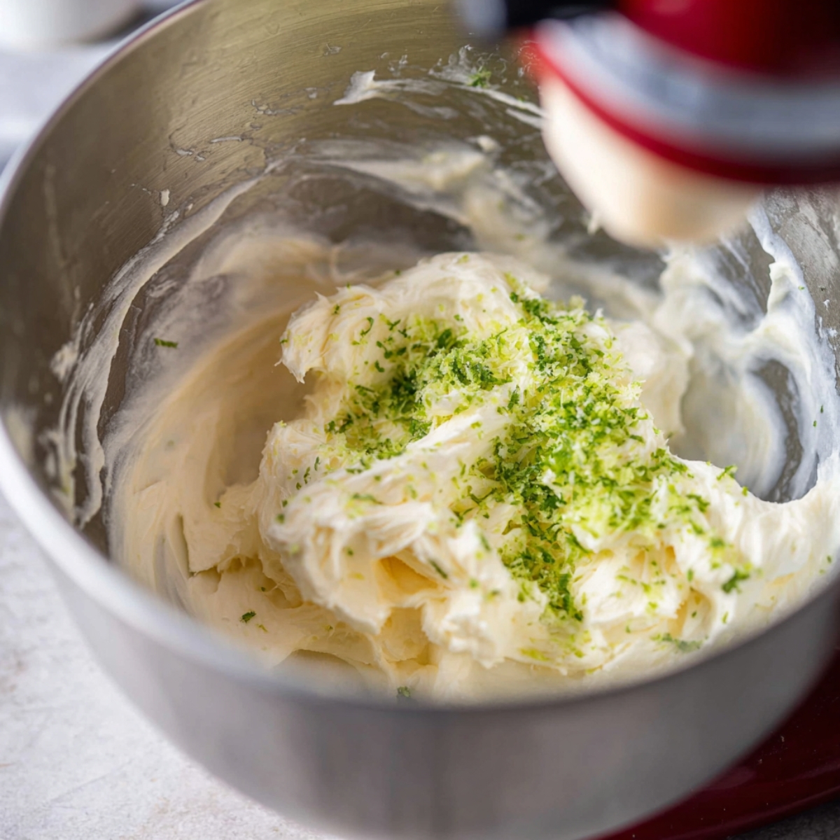 Easy Key Lime Cupcakes Recipe 10 Key lime cupcake batter filled in muffin liners, ready for baking.