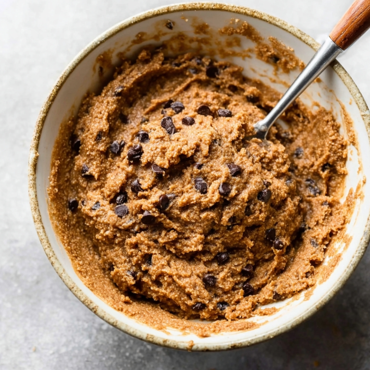 Healthy Bran Muffins Recipe 10 Muffin batter with chocolate chips, mixed and ready to be spooned into muffin cups for baking.