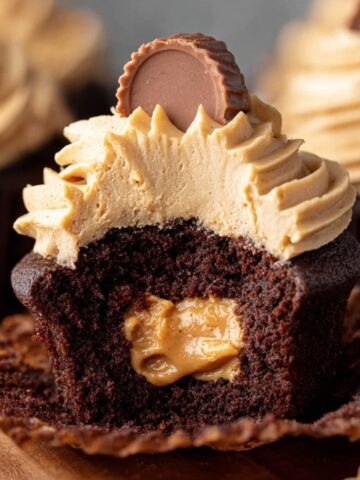 Easy Peanut Butter Cup Cupcakes 1 Peanut Butter Cup Cupcakes with frosting and a peanut butter center.