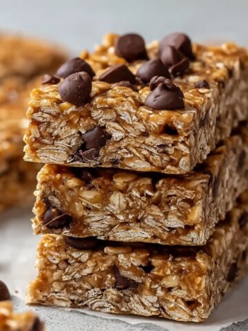 Healthy Peanut Butter Granola Bars Recipe 1 Stacked Peanut Butter Granola Bars, showing layers of oats and chocolate chips.