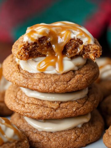 Easy Sticky Toffee Pudding Cookies 6 A stack of gooey Sticky Toffee Pudding Cookies filled with toffee and drizzled with caramel sauce.