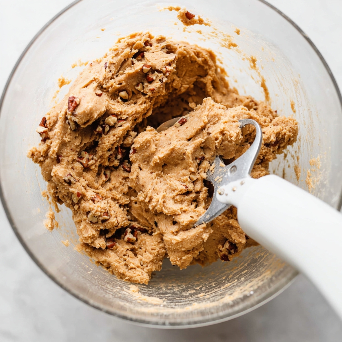 Pecan Sugar Cookies with Brown Butter Icing Recipe 10 Pecan brown sugar cookie dough in glass mixing bowl