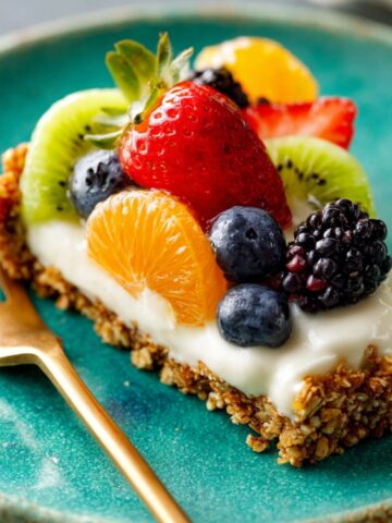 No-Bake Greek Yogurt Fruit Tart 1 No-Bake Greek Yogurt Fruit Tart slice with berries and kiwi.