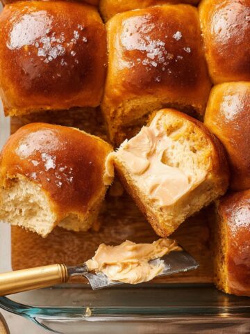 Sweet Potato Rolls Recipe 1 Golden baked Sweet Potato Rolls with cinnamon butter.
